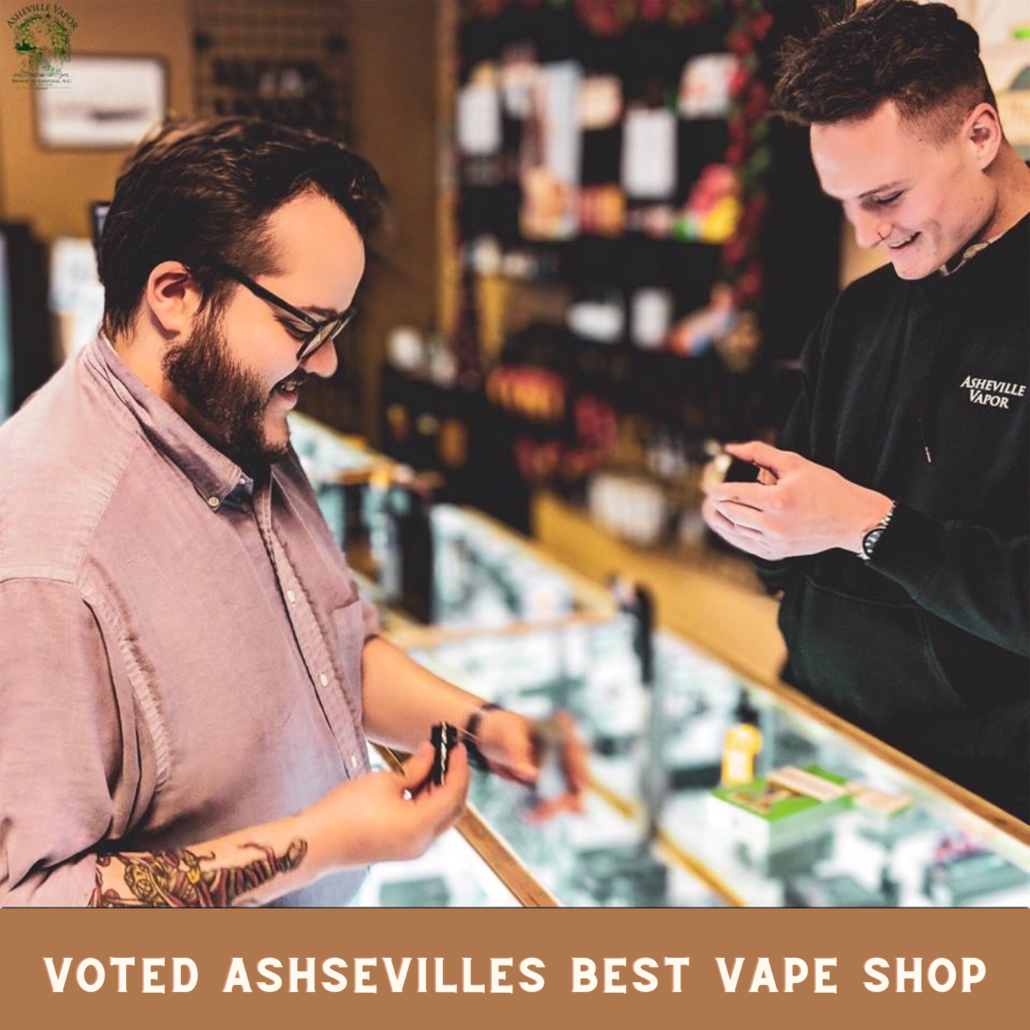 One of our customer service specialists helping a customer with their vape in our Arden store.